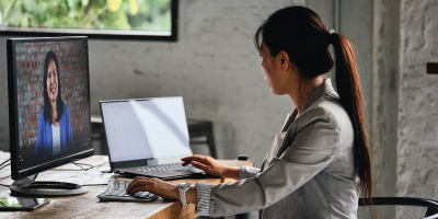 A small group of professionals at work within a co-working space online - Microsoft SharePoint Modern Experience: Site Basics - Microsoft Outlook